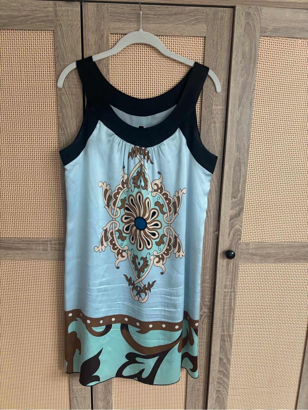 Sleeveless Light Blue Printed Mini Dress with Black Trim